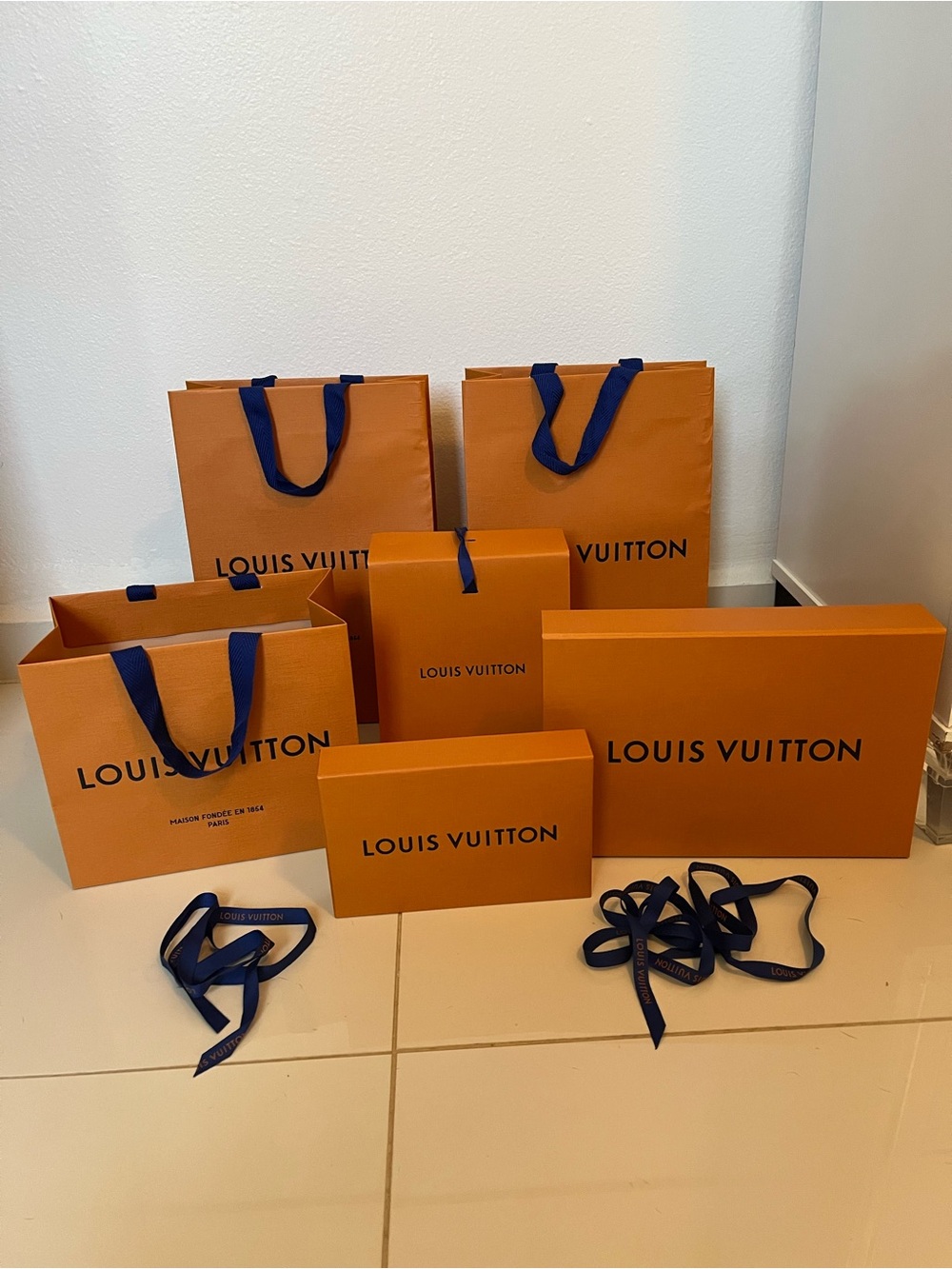 Louis Vuitton Orange Boxes and Bags with Deep Blue Ribbons